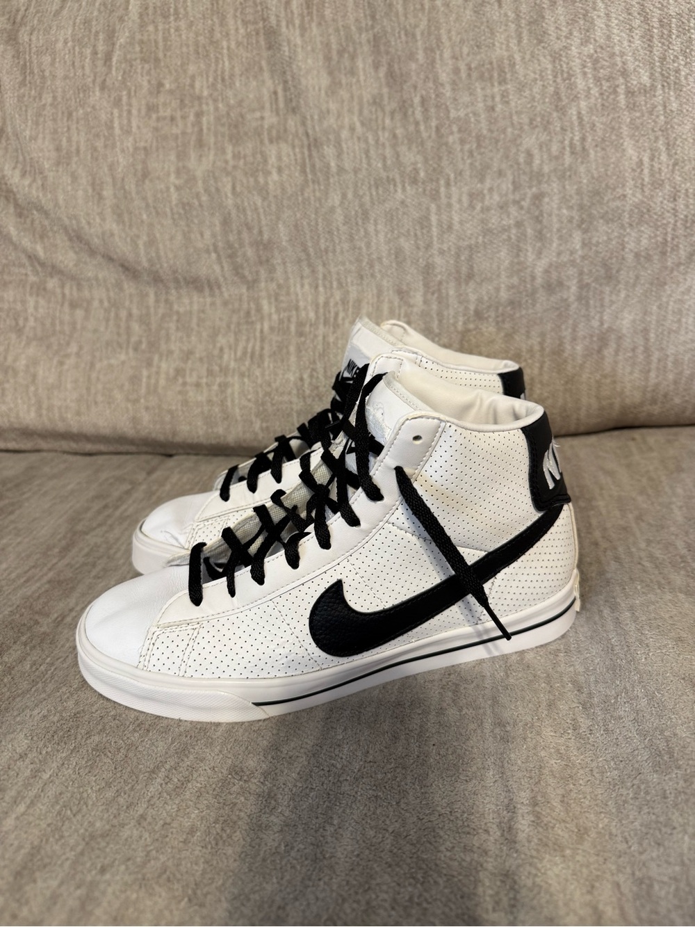 Nike White and Black High-Top Sneakers with Perforated Upper and Black Swoosh